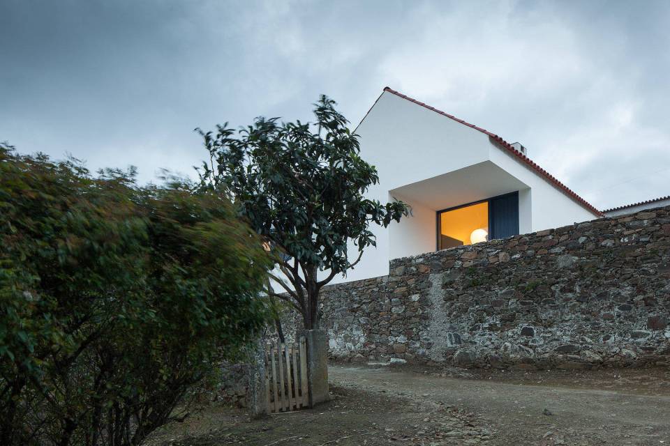 This caretaker's residence on a vineyard in Portugal was designed to complement the older buildings on the site. It has 2 bedrooms in 753 sq ft. | www.facebook.com/SmallHouseBliss