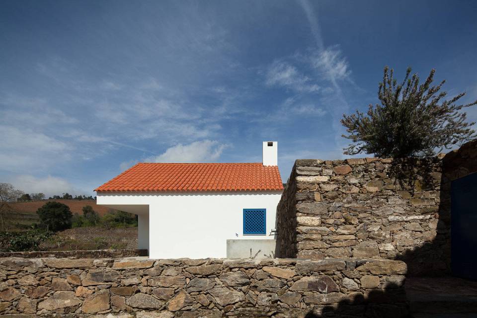 This caretaker's residence on a vineyard in Portugal was designed to complement the older buildings on the site. It has 2 bedrooms in 753 sq ft. | www.facebook.com/SmallHouseBliss