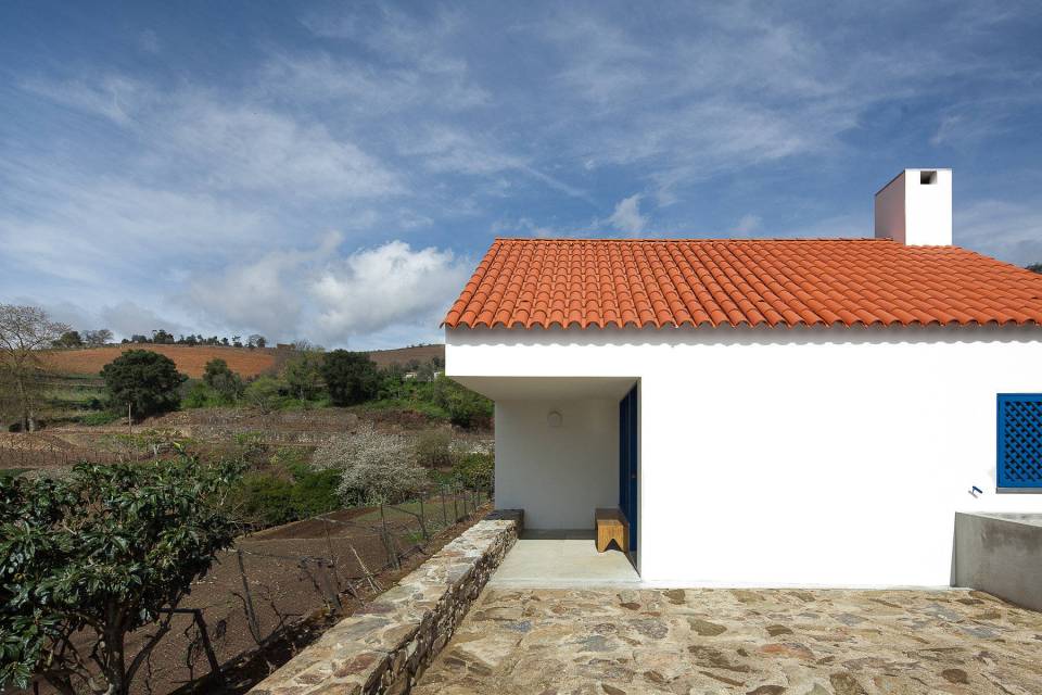 This caretaker's residence on a vineyard in Portugal was designed to complement the older buildings on the site. It has 2 bedrooms in 753 sq ft. | www.facebook.com/SmallHouseBliss