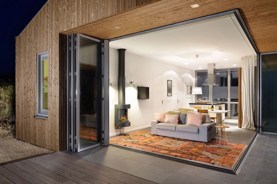 This vacation cottage sits on the sand dunes of a Dutch coastal island. It has two small bedrooms in 646 sq ft. | www.facebook.com/SmallHouseBliss