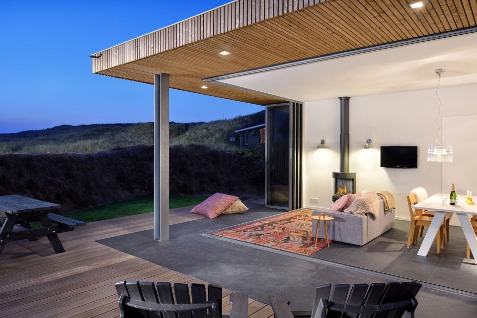 This vacation cottage sits on the sand dunes of a Dutch coastal island. It has two small bedrooms in 646 sq ft. | www.facebook.com/SmallHouseBliss