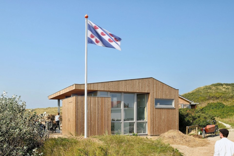 This vacation cottage sits on the sand dunes of a Dutch coastal island. It has two small bedrooms in 646 sq ft. | www.facebook.com/SmallHouseBliss