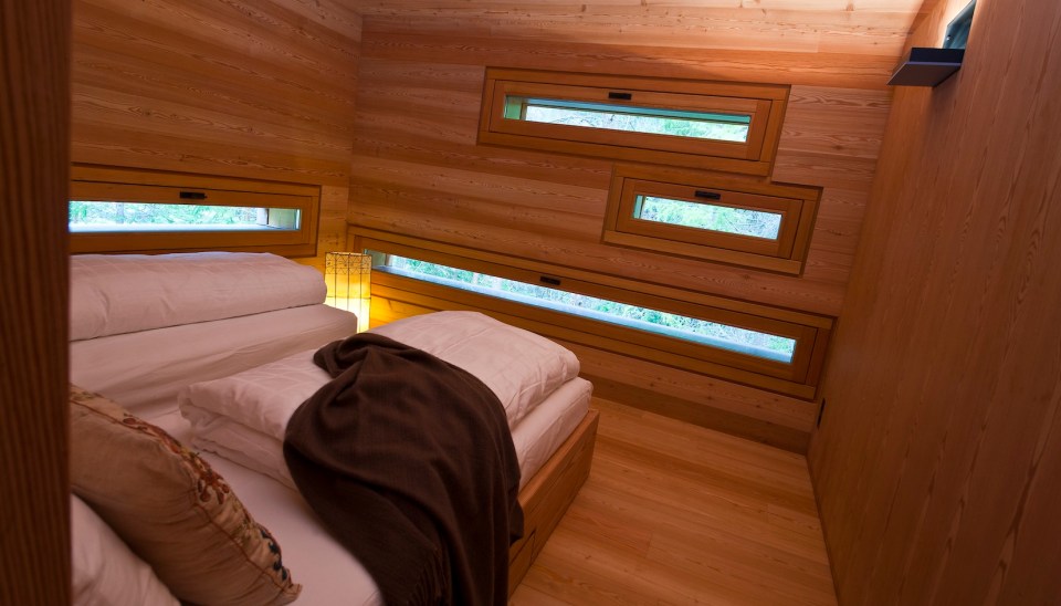 An alpine lodge and adjacent sleeping cabin in the alps of South Tyrol, Italy. Together they have 3 bedrooms in 1,399 sq ft. | www.facebook.com/SmallHouseBliss