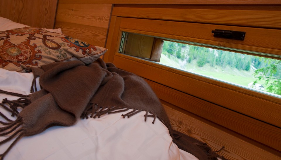 An alpine lodge and adjacent sleeping cabin in the alps of South Tyrol, Italy. Together they have 3 bedrooms in 1,399 sq ft. | www.facebook.com/SmallHouseBliss