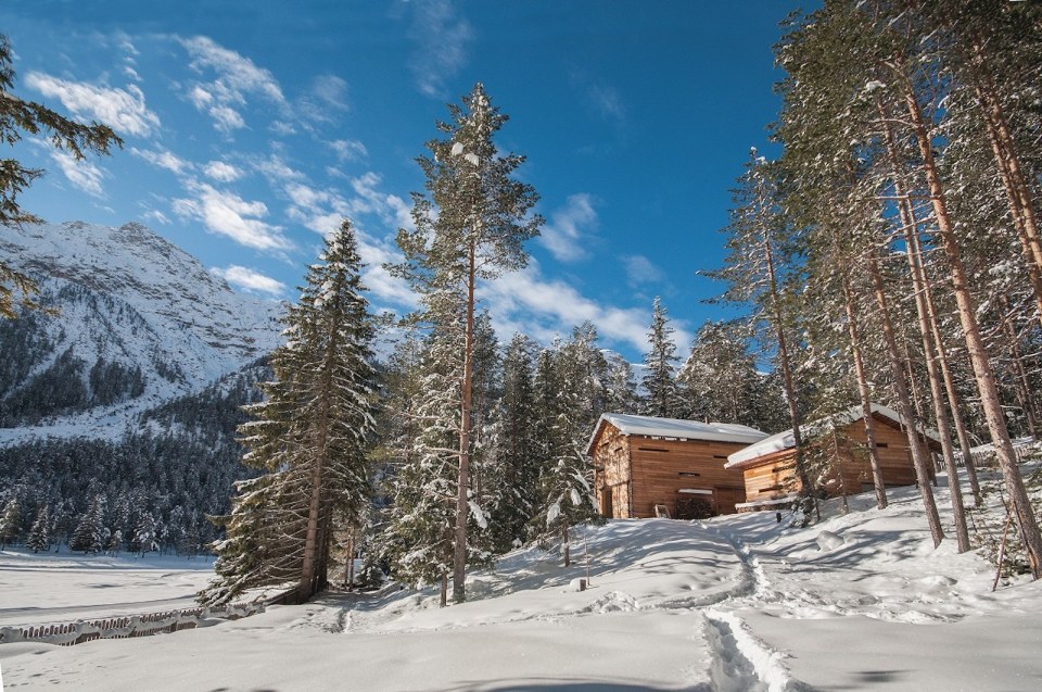 An alpine lodge and adjacent sleeping cabin in the alps of South Tyrol, Italy. Together they have 3 bedrooms in 1,399 sq ft. | www.facebook.com/SmallHouseBliss