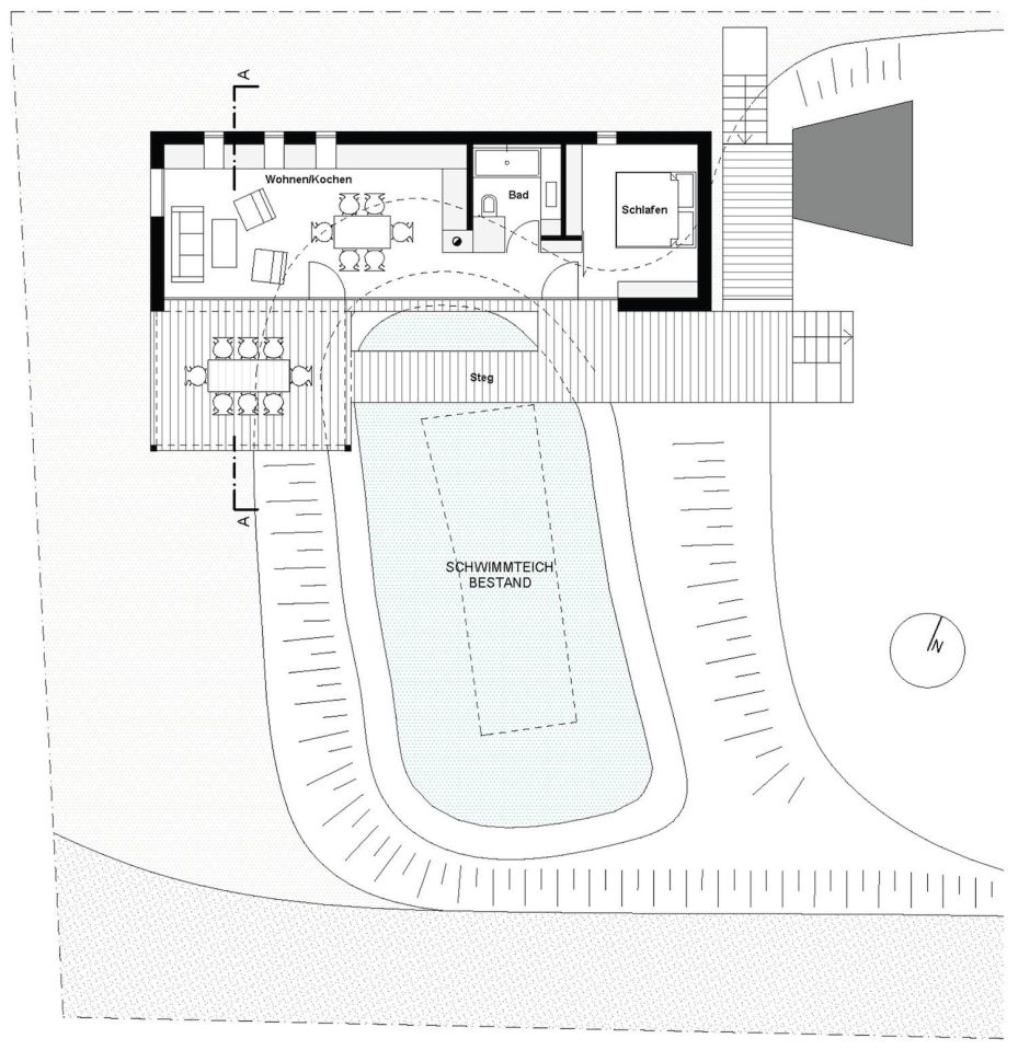 This small house sits at the edge of a pond surrounded by mature landscaping. It has one bedroom in 538 sq ft. | www.facebook.com/SmallHouseBliss