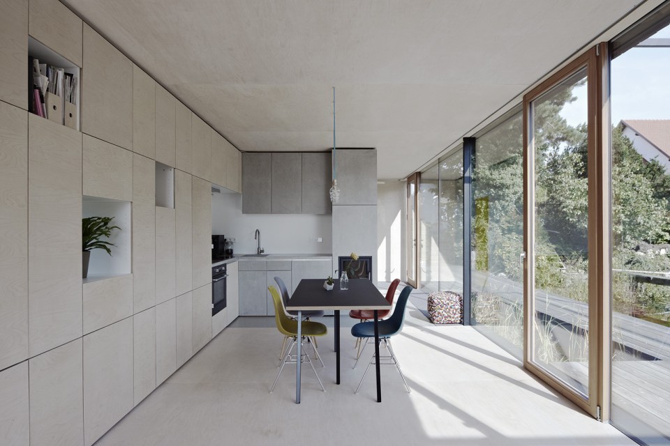 This small house sits at the edge of a pond surrounded by mature landscaping. It has one bedroom in 538 sq ft. | www.facebook.com/SmallHouseBliss