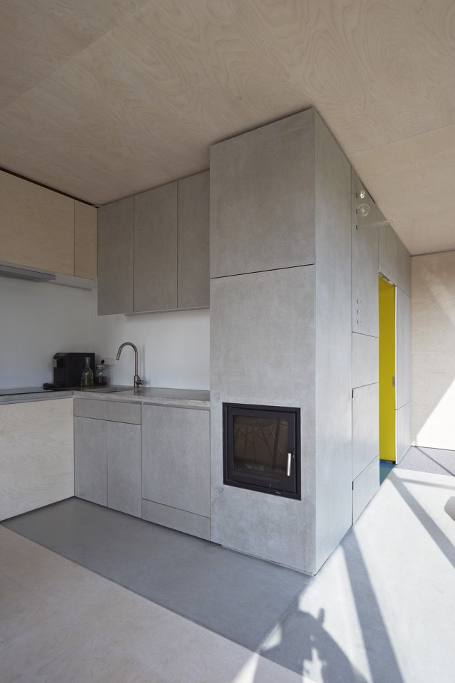 This small house sits at the edge of a pond surrounded by mature landscaping. It has one bedroom in 538 sq ft. | www.facebook.com/SmallHouseBliss