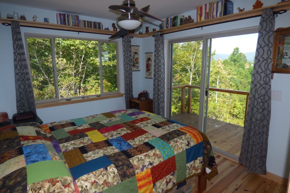 A modern cabin in the hills of North Carolina. It has one bedroom on the 704 sq ft ground floor plus a loft. | www.facebook.com/SmallHouseBliss