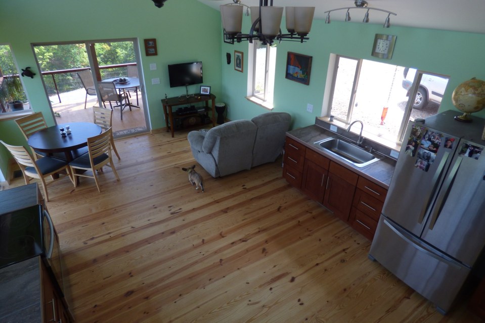 A modern cabin in the hills of North Carolina. It has one bedroom on the 704 sq ft ground floor plus a loft. | www.facebook.com/SmallHouseBliss