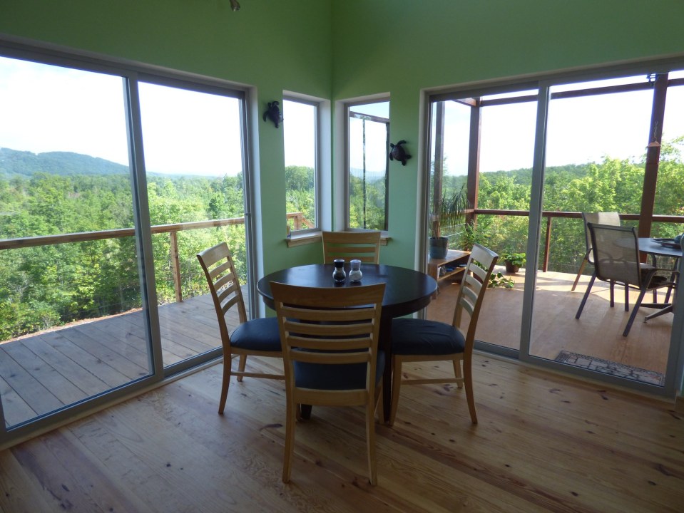 A modern cabin in the hills of North Carolina. It has one bedroom on the 704 sq ft ground floor plus a loft. | www.facebook.com/SmallHouseBliss
