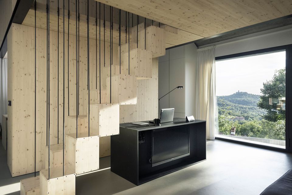 This stone and concrete cottage is an update of traditional stone houses in the area. Designed for a family of 4, the house has 2 bedrooms in 990 sq ft. | www.facebook.com/SmallHouseBliss