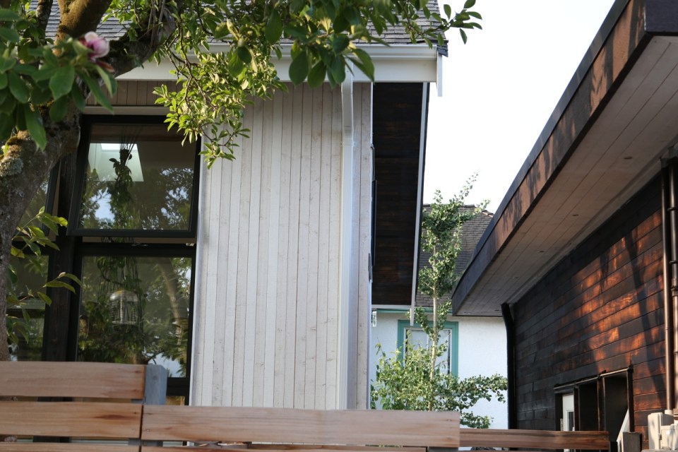 Magnolia Tree Lane House, a stylish new laneway house, has a reverse floor plan with 1 bedroom in 670 sq ft. | www.facebook.com/SmallHouseBliss