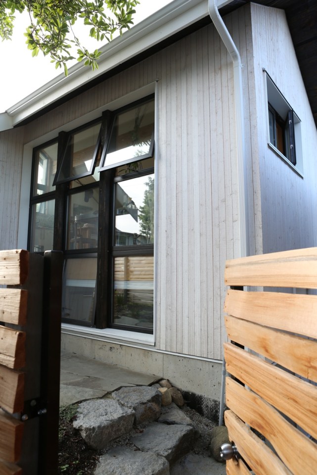 Magnolia Tree Lane House, a stylish new laneway house, has a reverse floor plan with 1 bedroom in 670 sq ft. | www.facebook.com/SmallHouseBliss