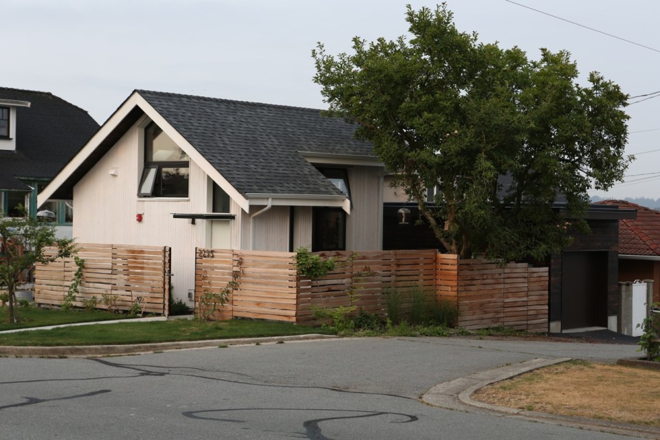 Magnolia Tree Lane House, a stylish new laneway house, has a reverse floor plan with 1 bedroom in 670 sq ft. | www.facebook.com/SmallHouseBliss