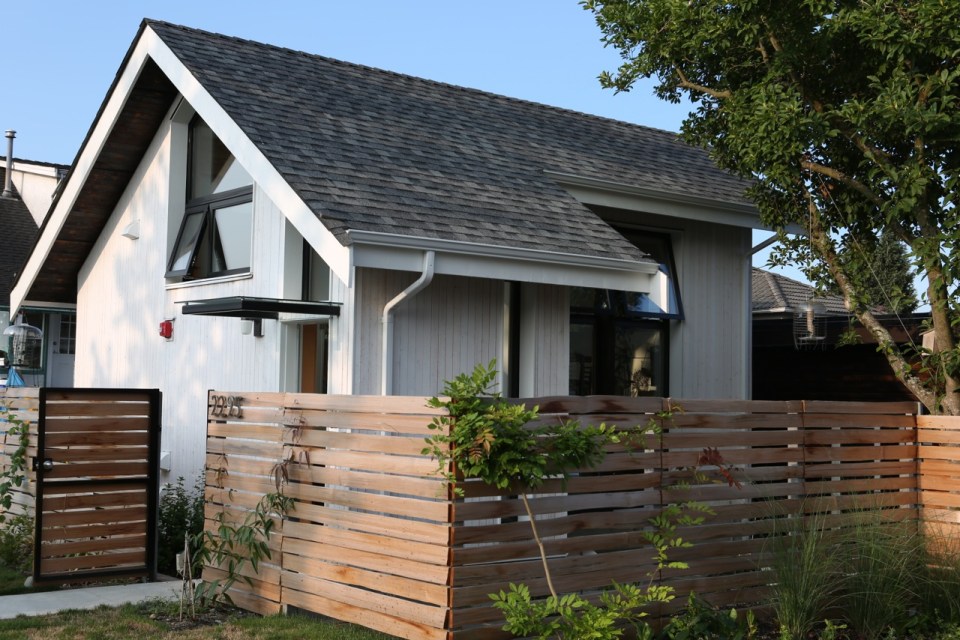 Magnolia Tree Lane House, a stylish new laneway house, has a reverse floor plan with 1 bedroom in 670 sq ft. | www.facebook.com/SmallHouseBliss