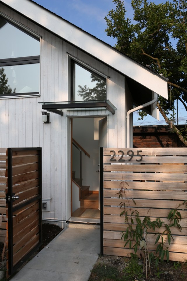 Magnolia Tree Lane House, a stylish new laneway house, has a reverse floor plan with 1 bedroom in 670 sq ft. | www.facebook.com/SmallHouseBliss