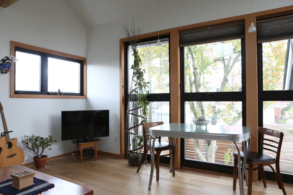 Magnolia Tree Lane House, a stylish new laneway house, has a reverse floor plan with 1 bedroom in 670 sq ft. | www.facebook.com/SmallHouseBliss