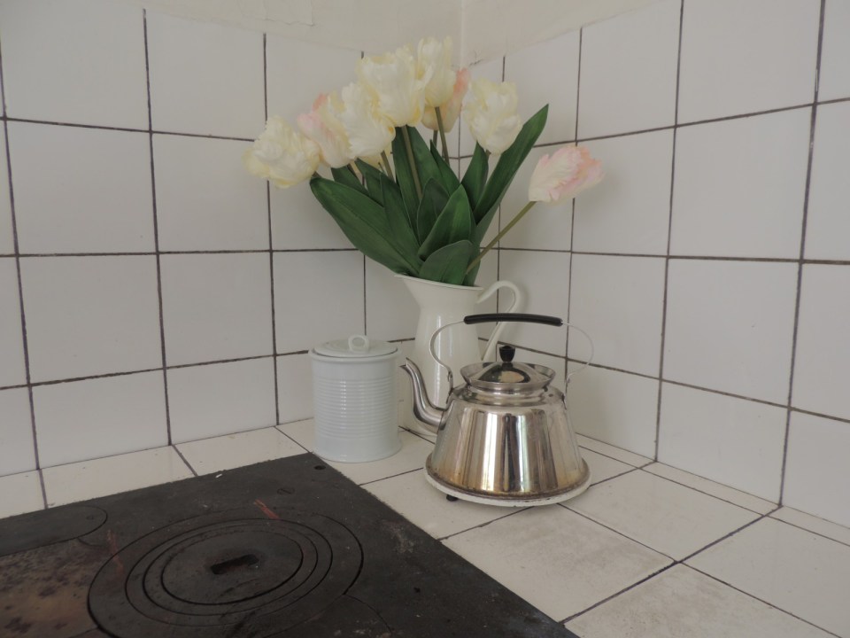 This hundred-year-old farmhouse in the Swedish countryside retains much of its original interior and character. It has 3 bedrooms in roughly 1,020 sq ft. | www.facebook.com/SmallHouseBliss