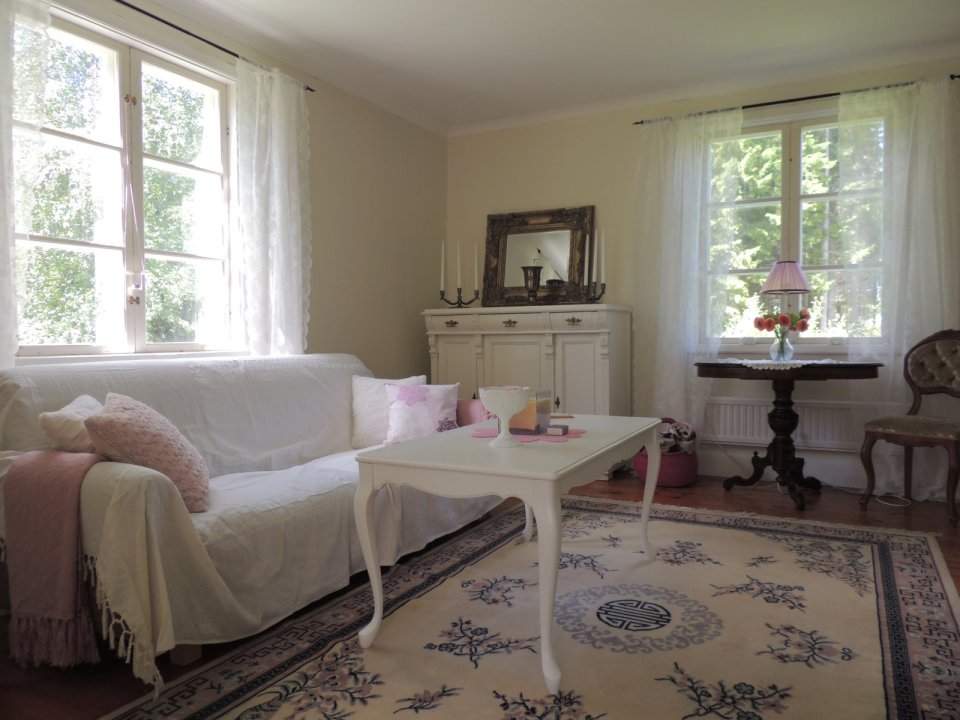 This hundred-year-old farmhouse in the Swedish countryside retains much of its original interior and character. It has 3 bedrooms in roughly 1,020 sq ft. | www.facebook.com/SmallHouseBliss