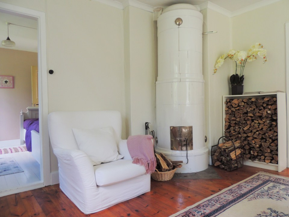 This hundred-year-old farmhouse in the Swedish countryside retains much of its original interior and character. It has 3 bedrooms in roughly 1,020 sq ft. | www.facebook.com/SmallHouseBliss