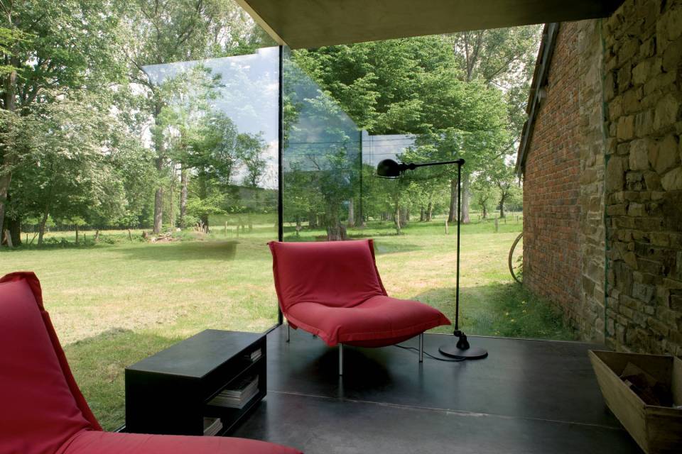 A stone outbuilding became a small house with the addition of a steel and glass pavilion. | www.facebook.com/SmallHouseBliss