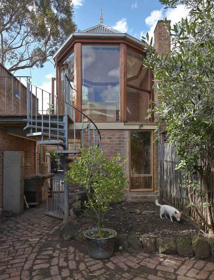 The "Tardis", a tiny tower house built within an existing backyard structure. | www.facebook.com/SmallHouseBliss