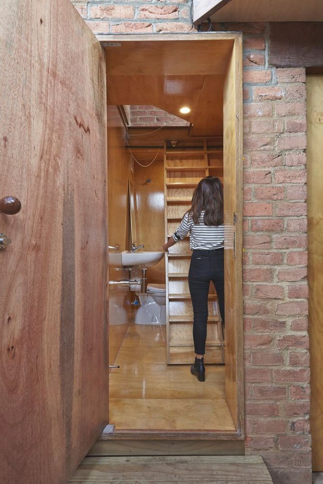 The "Tardis", a tiny tower house built within an existing backyard structure. | www.facebook.com/SmallHouseBliss