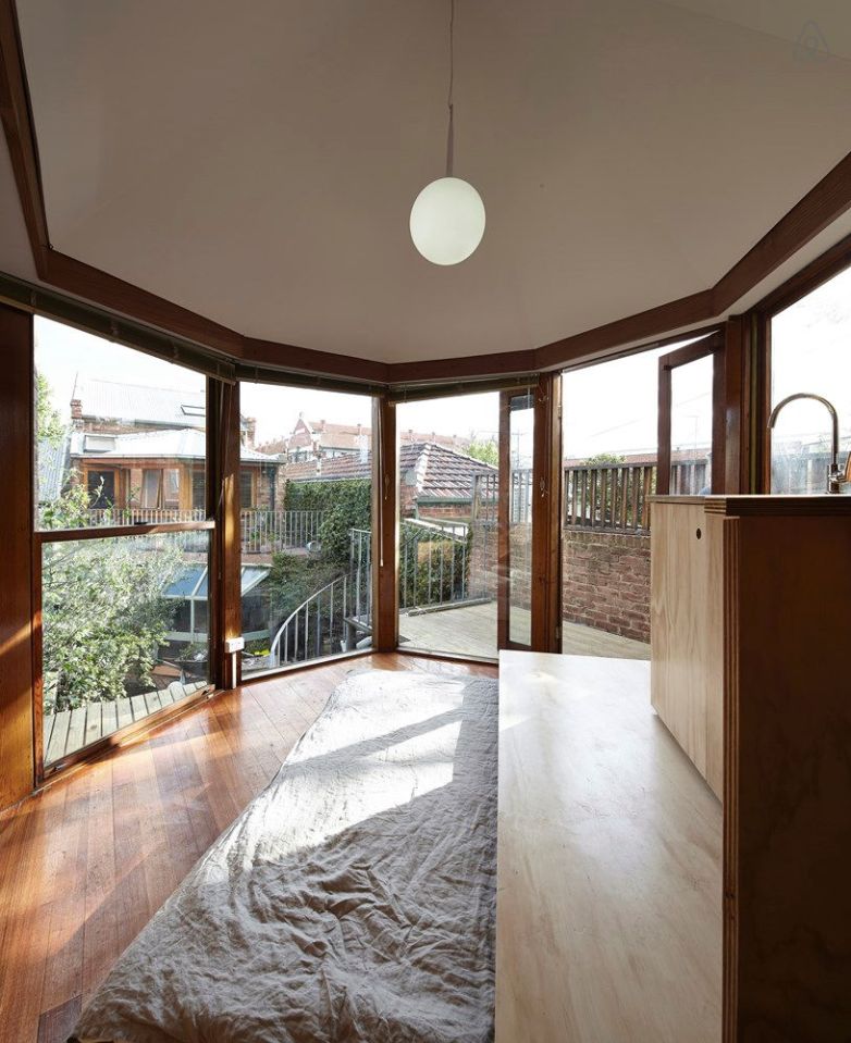 The "Tardis", a tiny tower house built within an existing backyard structure. | www.facebook.com/SmallHouseBliss