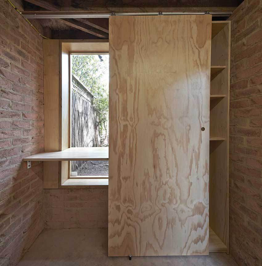 The "Tardis", a tiny tower house built within an existing backyard structure. | www.facebook.com/SmallHouseBliss