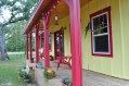 This country cottage in Texas has one bedroom and a loft in 416 sq ft. | www.facebook.com/SmallHouseBliss