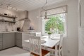 This simple cottage in the Swedish countryside has 2 bedrooms. A monochromatic color scheme makes it appear more spacious than its 614 sq ft. | www.facebook.com/SmallHouseBliss