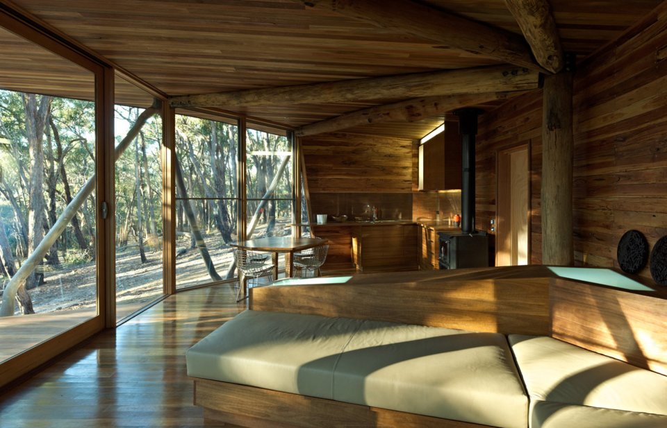 "Trunk House" in Australia uses forked tree trunks to support the roof. It has 2 bedrooms in 915 sq ft. | www.facebook.com/SmallHouseBliss