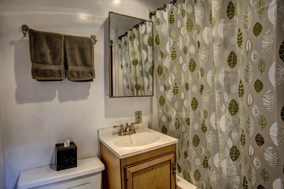 This quirky float house on Seattle's Lake Union was built in 1920 and added on over the years. It now has 640 sq ft with one bedroom. | www.facebook.com/SmallHouseBliss