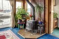 This quirky float house on Seattle's Lake Union was built in 1920 and added on over the years. It now has 640 sq ft with one bedroom. | www.facebook.com/SmallHouseBliss
