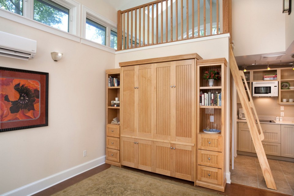 This little backyard cottage feels spacious despite a floor plan of just 340 sq ft plus a loft. | www.facebook.com/SmallHouseBliss