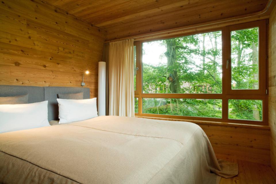 The Baumgeflüster treehouse resort in Germany. Each treehouse has one bedroom in 383 sq ft. | www.facebook.com/SmallHouseBliss
