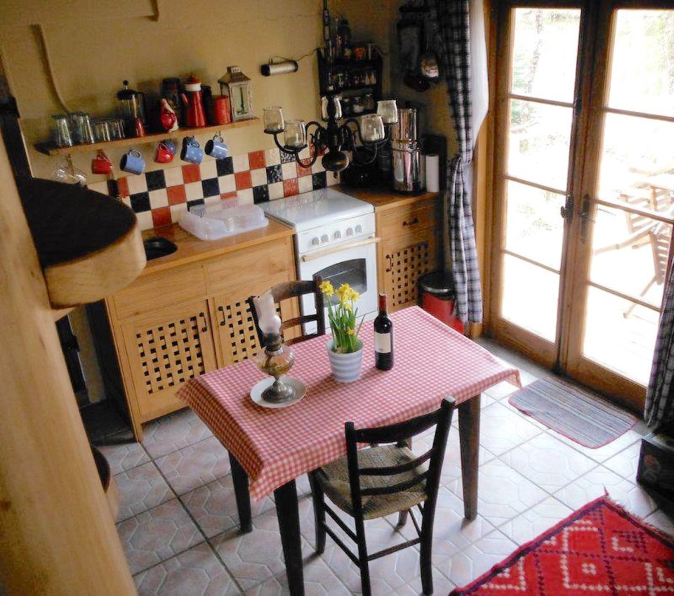 The tiny off-grid Woodsman's Cabin in France, built with rustic charm by the owners. | www.facebook.com/SmallHouseBliss