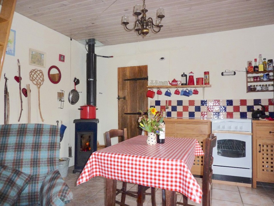 The tiny off-grid Woodsman's Cabin in France, built with rustic charm by the owners. | www.facebook.com/SmallHouseBliss