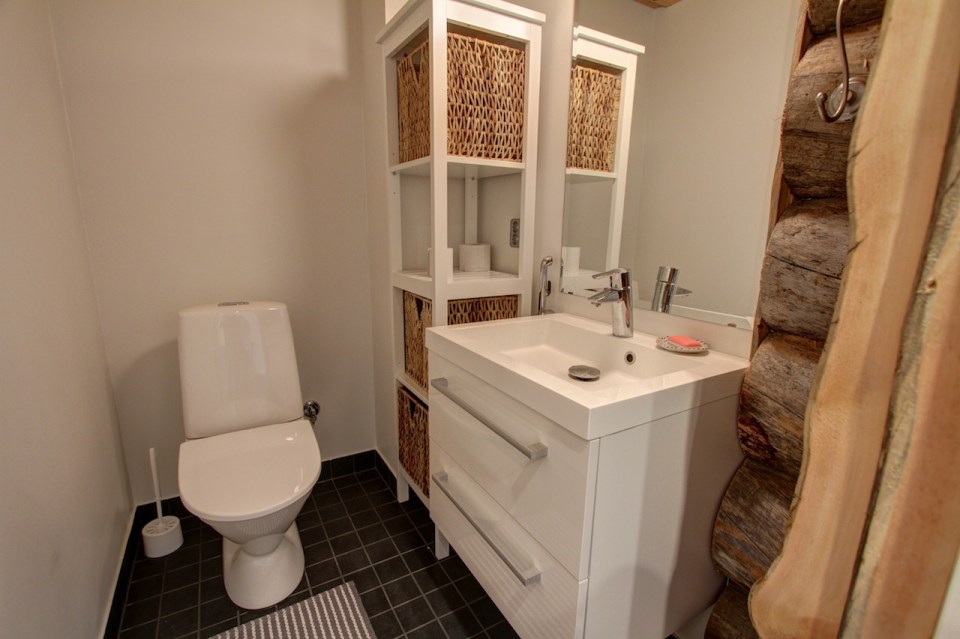 This modern log cabin in Finland has two bedrooms and a den in 969 sq ft. | www.facebook.com/SmallHouseBliss