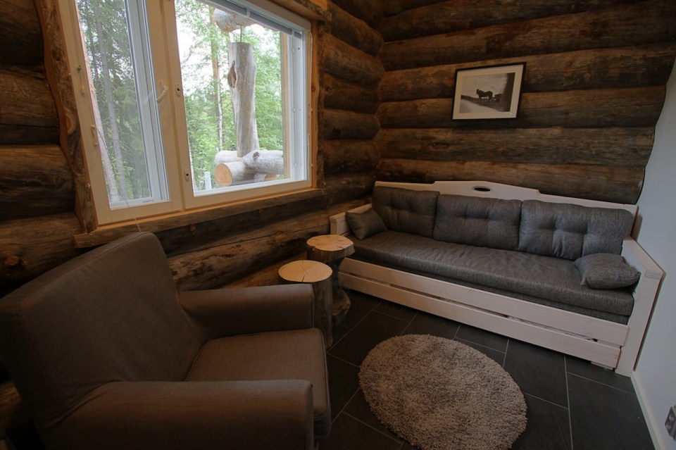 This modern log cabin in Finland has two bedrooms and a den in 969 sq ft. | www.facebook.com/SmallHouseBliss