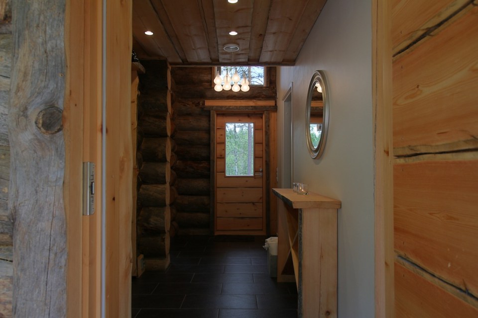 This modern log cabin in Finland has two bedrooms and a den in 969 sq ft. | www.facebook.com/SmallHouseBliss