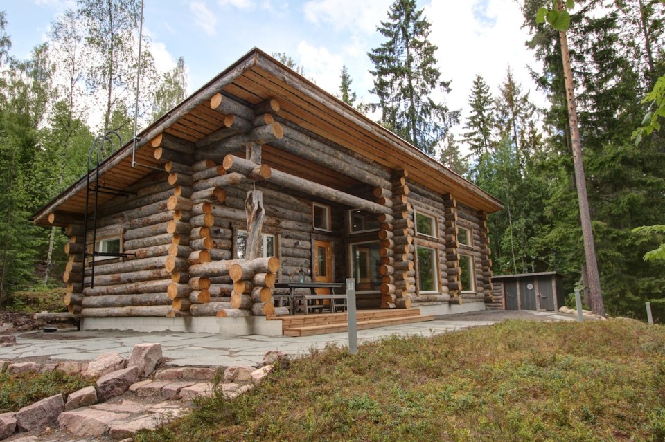 This modern log cabin in Finland has two bedrooms and a den in 969 sq ft. | www.facebook.com/SmallHouseBliss