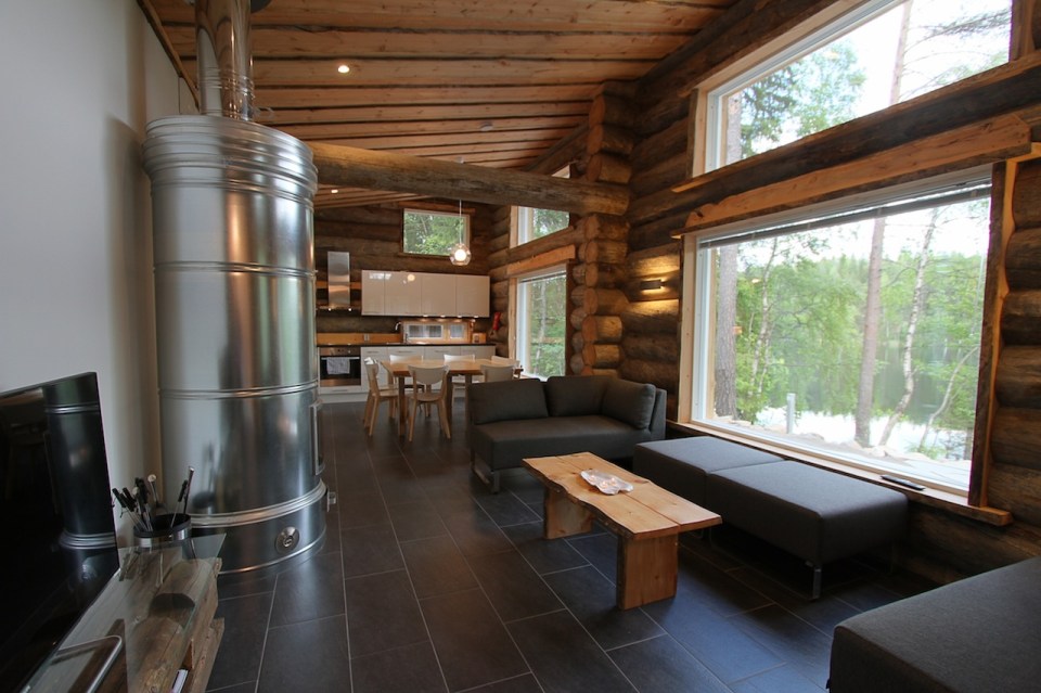 This modern log cabin in Finland has two bedrooms and a den in 969 sq ft. | www.facebook.com/SmallHouseBliss