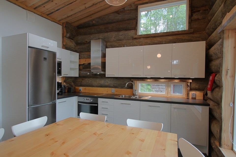 This modern log cabin in Finland has two bedrooms and a den in 969 sq ft. | www.facebook.com/SmallHouseBliss