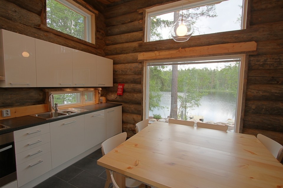 This modern log cabin in Finland has two bedrooms and a den in 969 sq ft. | www.facebook.com/SmallHouseBliss