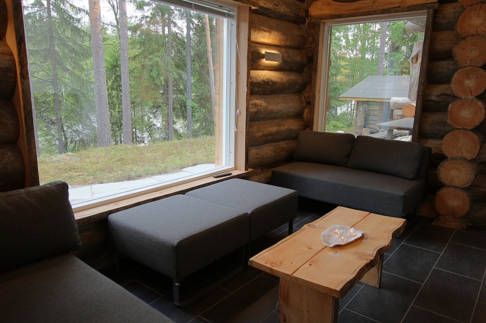 This modern log cabin in Finland has two bedrooms and a den in 969 sq ft. | www.facebook.com/SmallHouseBliss