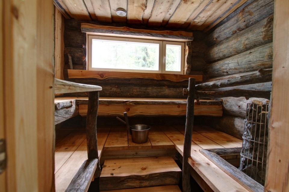 This modern log cabin in Finland has two bedrooms and a den in 969 sq ft. | www.facebook.com/SmallHouseBliss