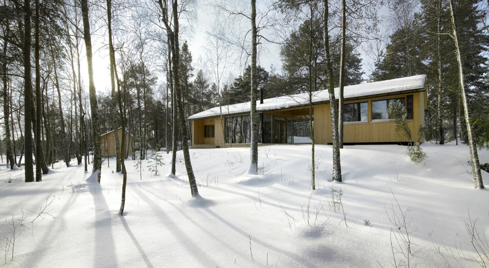 This small family vacation cabin combines a dogtrot floor plan with a Nordic design aesthetic. | www.facebook.com/SmallHouseBliss