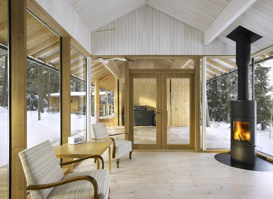 This small family vacation cabin combines a dogtrot floor plan with a Nordic design aesthetic. | www.facebook.com/SmallHouseBliss